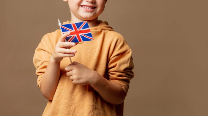 child holding british flag